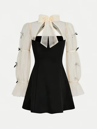 Spring and autumn fashion for girls: elegant, refined, vintage, Hepburn-style black dress.